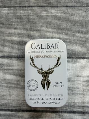Preview: Weiße Metalldose mit Aufdruck „Calibar – Herzfasern – No. 9 Vanille“.